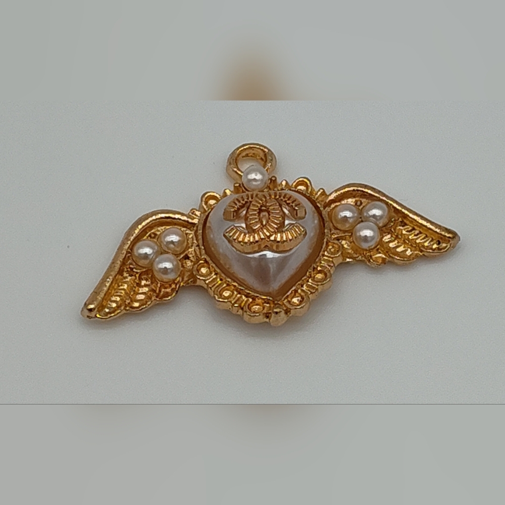 CHANEL A19V 2019 Cruise Winged CC Pearl Heart Charm Pendant Pull Gold France